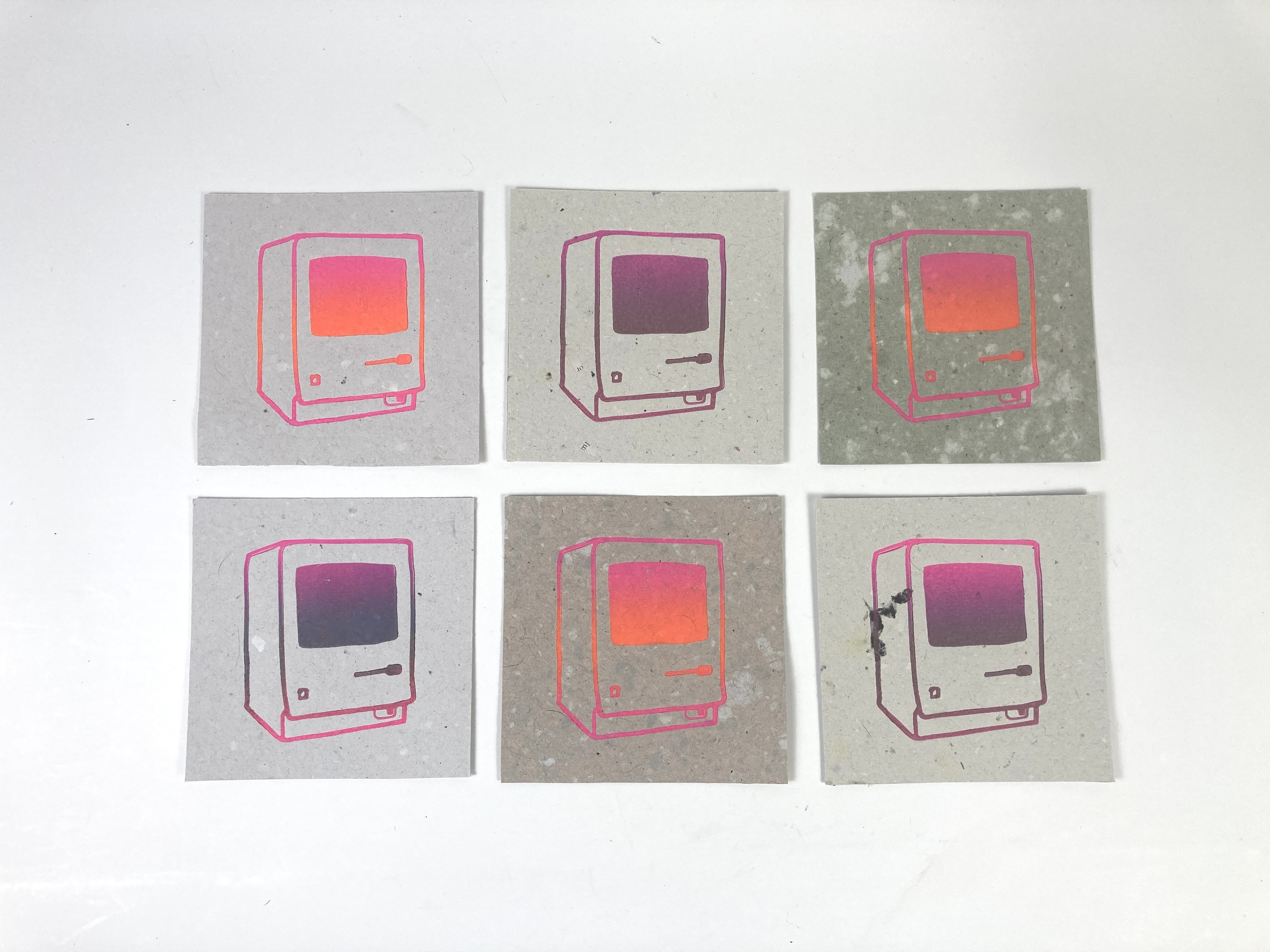 A series of relief prints of an Apple Macintosh Computer.