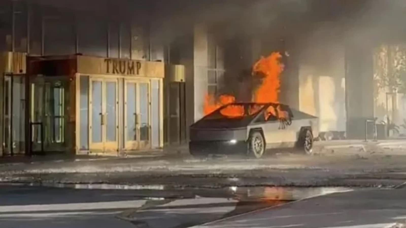 Tesla car on fire in front of Trump hotel