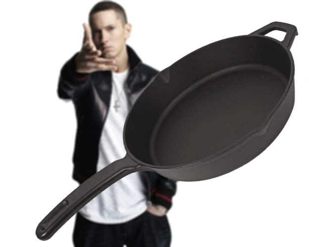 Eminem throwing a cast iron pan at the camera