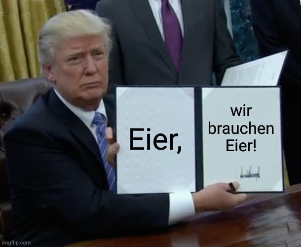 Donald Trump holding a sign saying "Eier, wir brauchen Eier!"